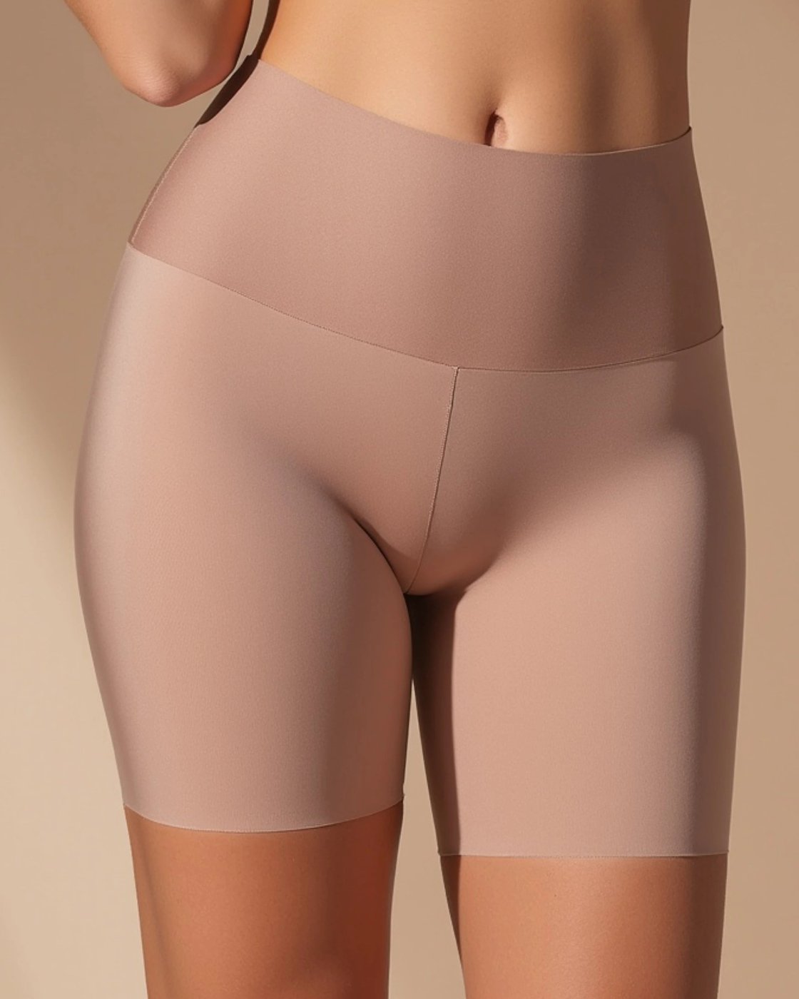 The high waistband of the Pomence Tuck-N-Lift Seamless Slip Short sitting flat on the waist