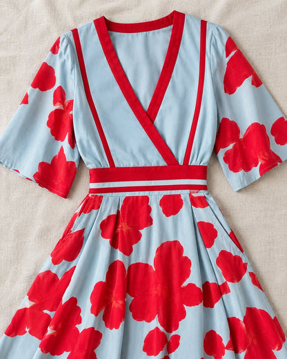 Pomence™ Floral V-Neck Long Dress. Pomence Floral V-Neck Long Dress, V-neckline, red trim and waistband close-up, Red
