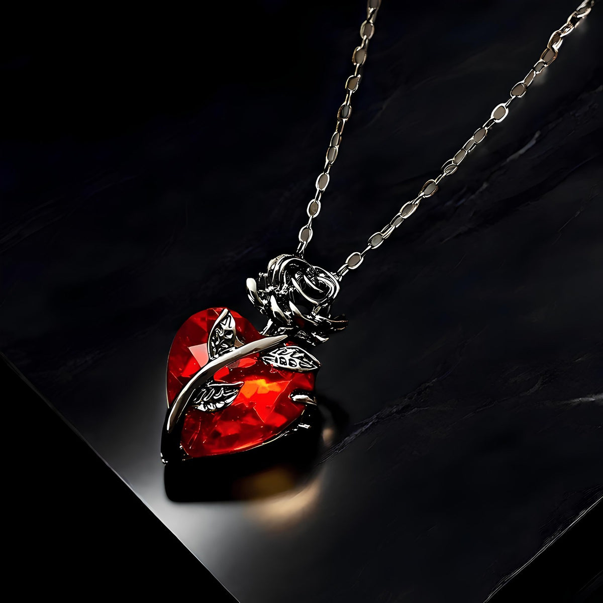 Pomence Blood Rose Necklace in Black at an angle on dark stone