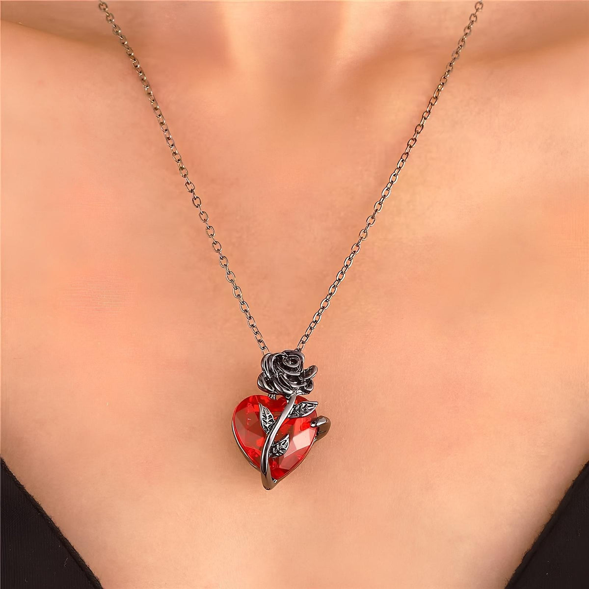 Pomence Blood Rose Necklace worn, the pendant sitting just below the collarbone