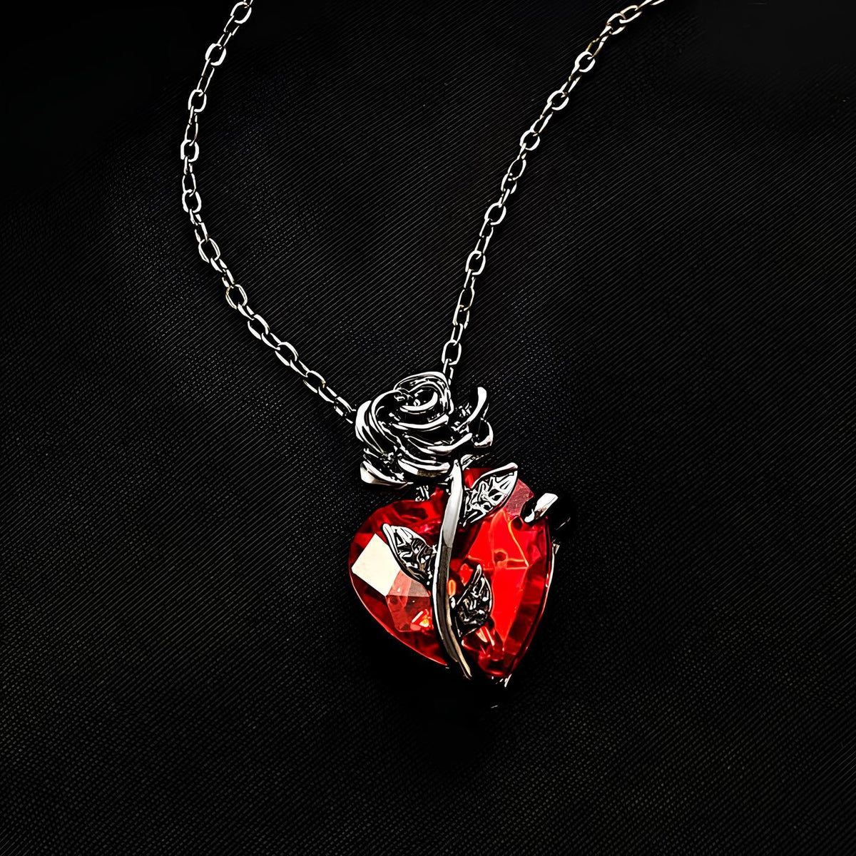 Pomence Blood Rose Necklace in Black on a dark background