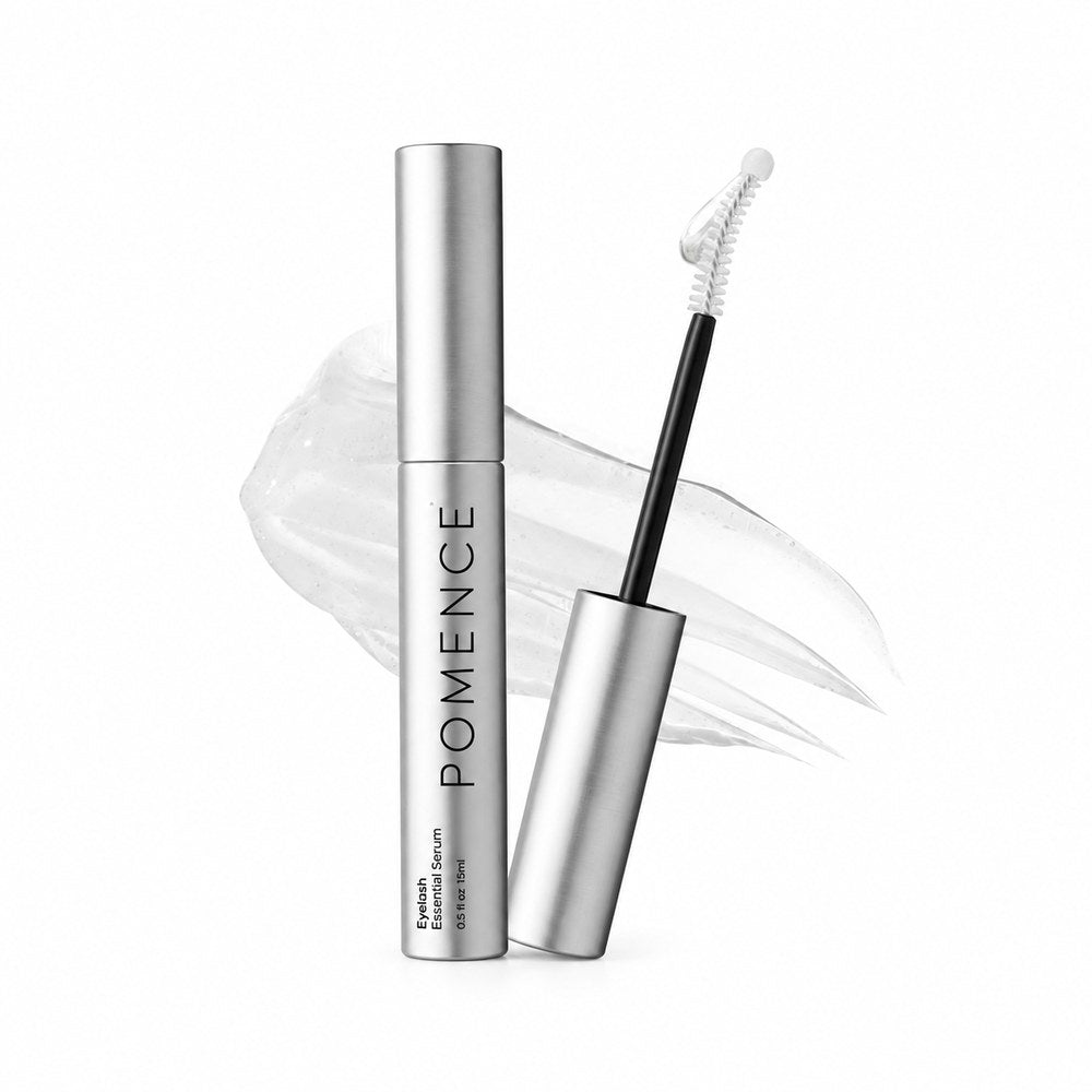 The silver 15ml Pomence Eyelash Growth Serum tube with its dual tip wand on white