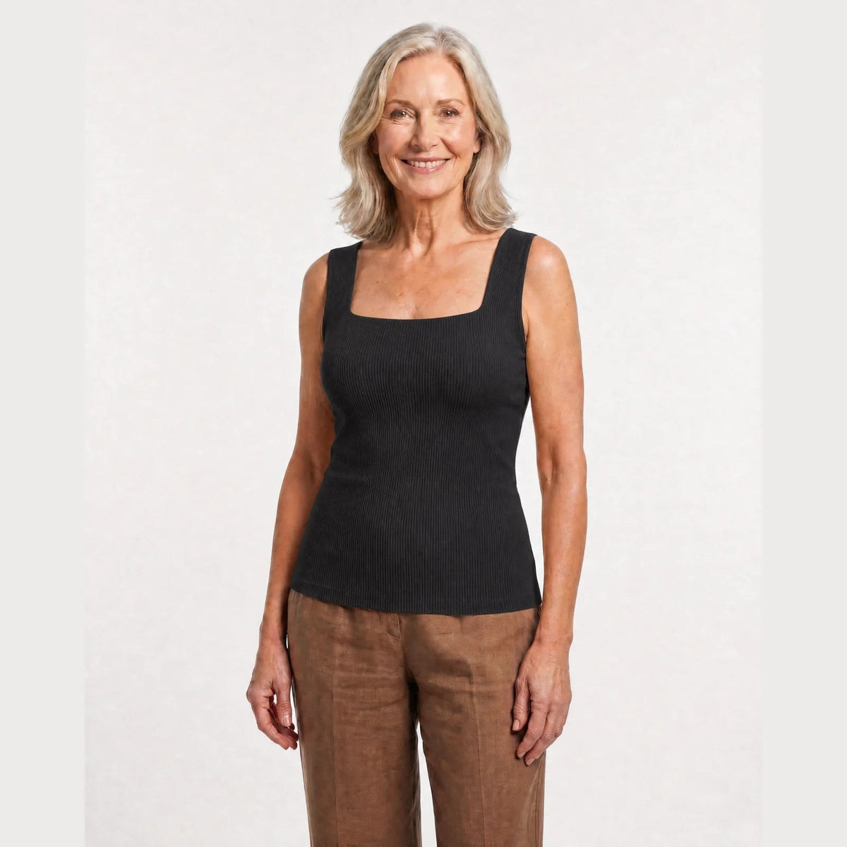 The Pomence Front-Support Bra Tank in Black, front view