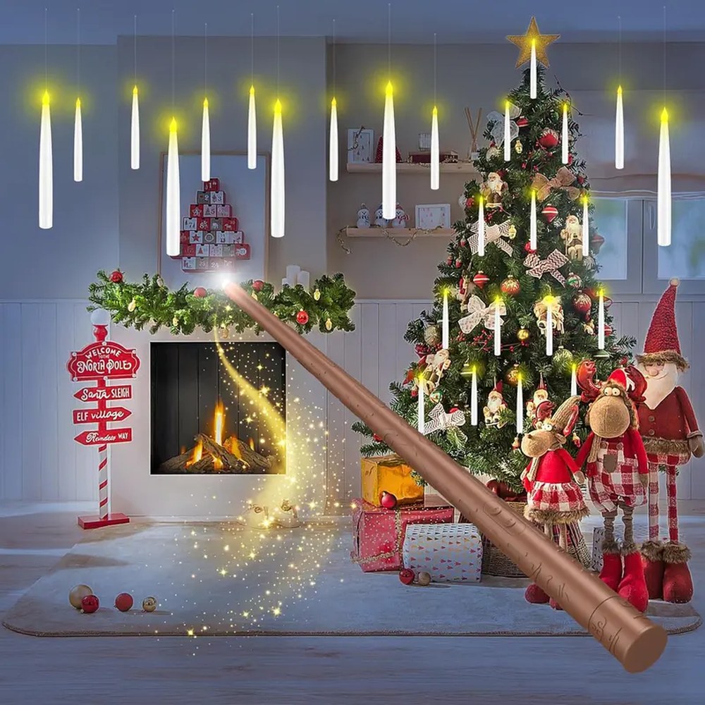 The wand remote in front of a Christmas living room lit by the Pomence LED Floating Candles