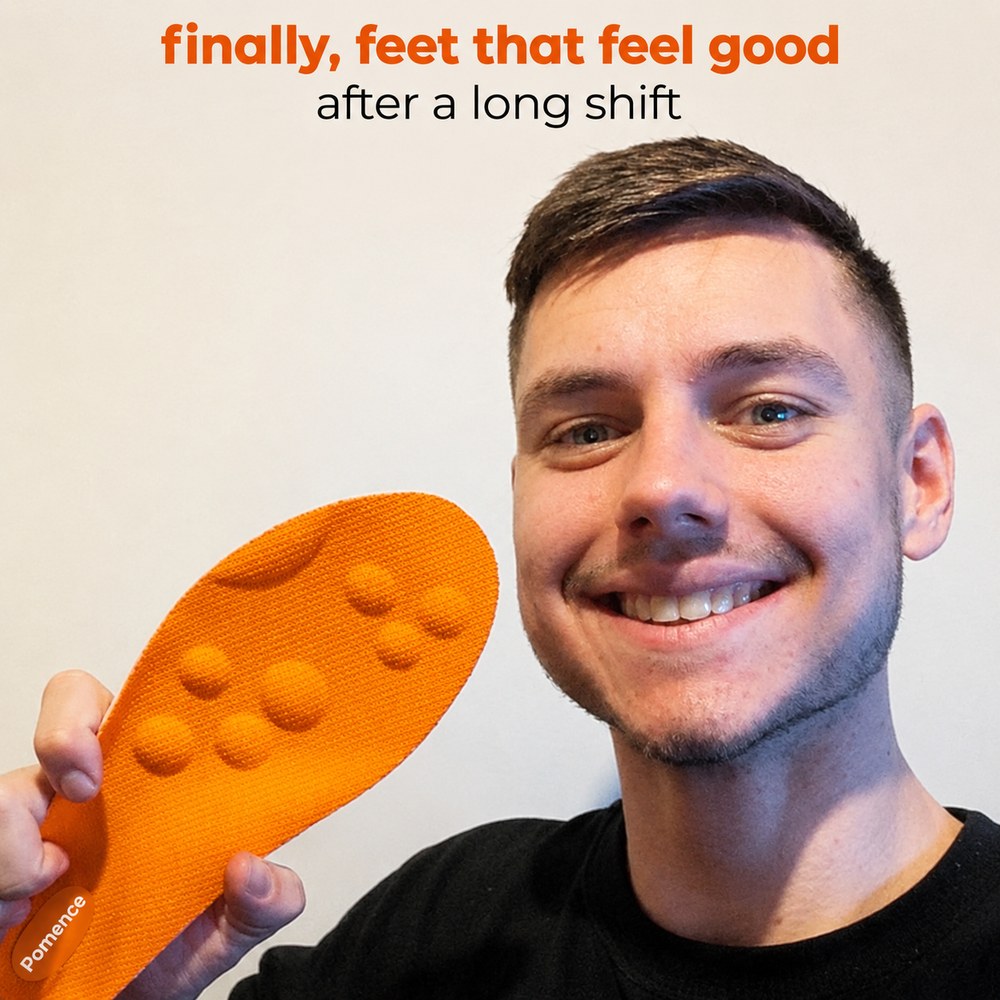 A customer holding up a Pomence Massage Insole, orange knit deck and massage nodes toward the camera