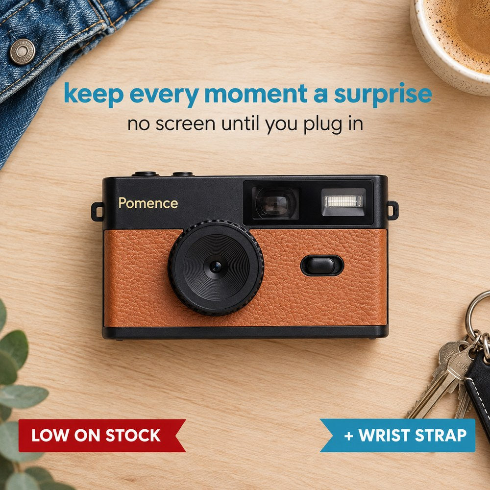 The Pomence Mini Retro Camera in tan, flat lay with a denim jacket, coffee and keys