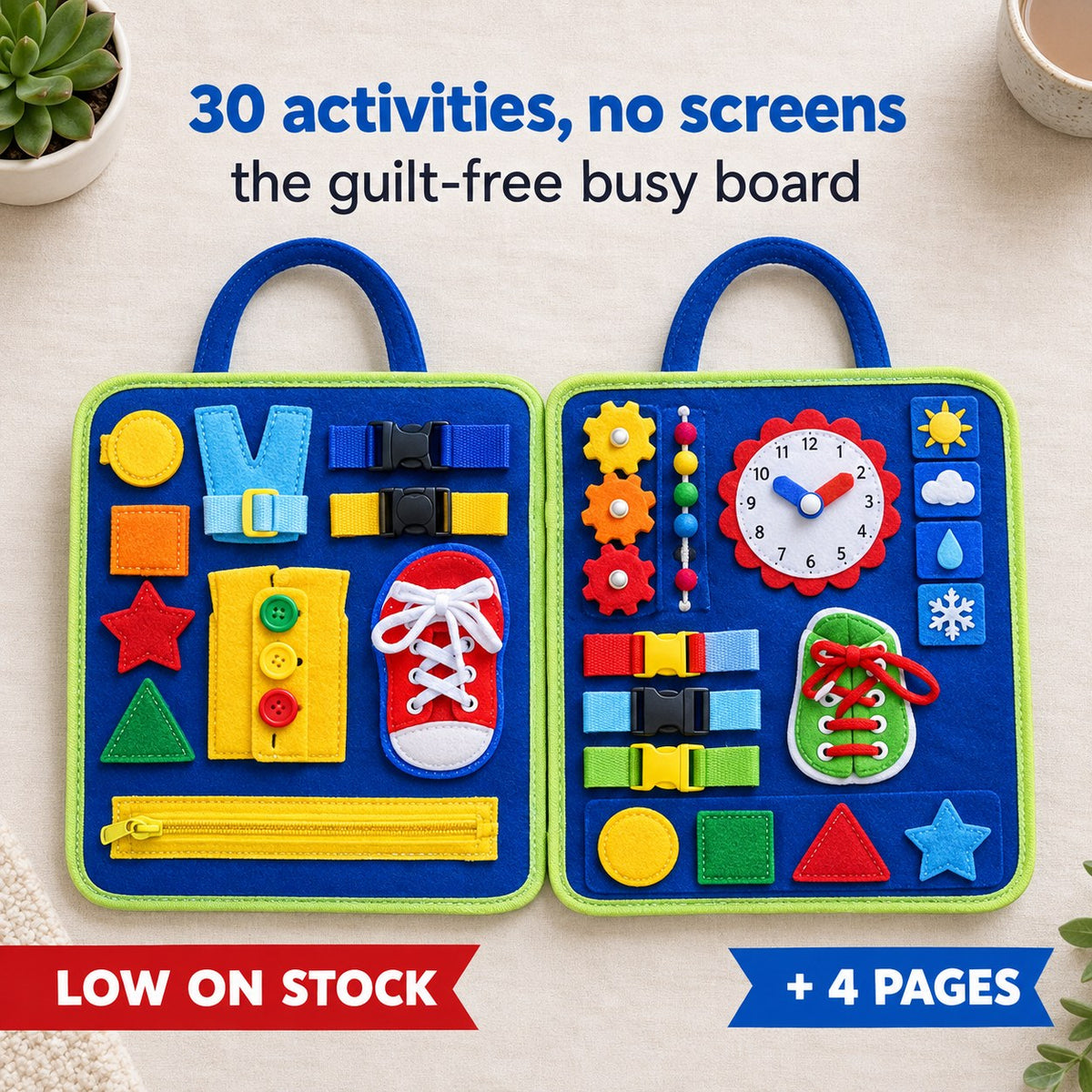 The Pomence Montessori Busy Board open flat like a book, both royal blue felt pages covered in buckles, buttons, a laced felt shoe, shapes, gears and a learning clock, flat lay on a pale linen surface in daylight