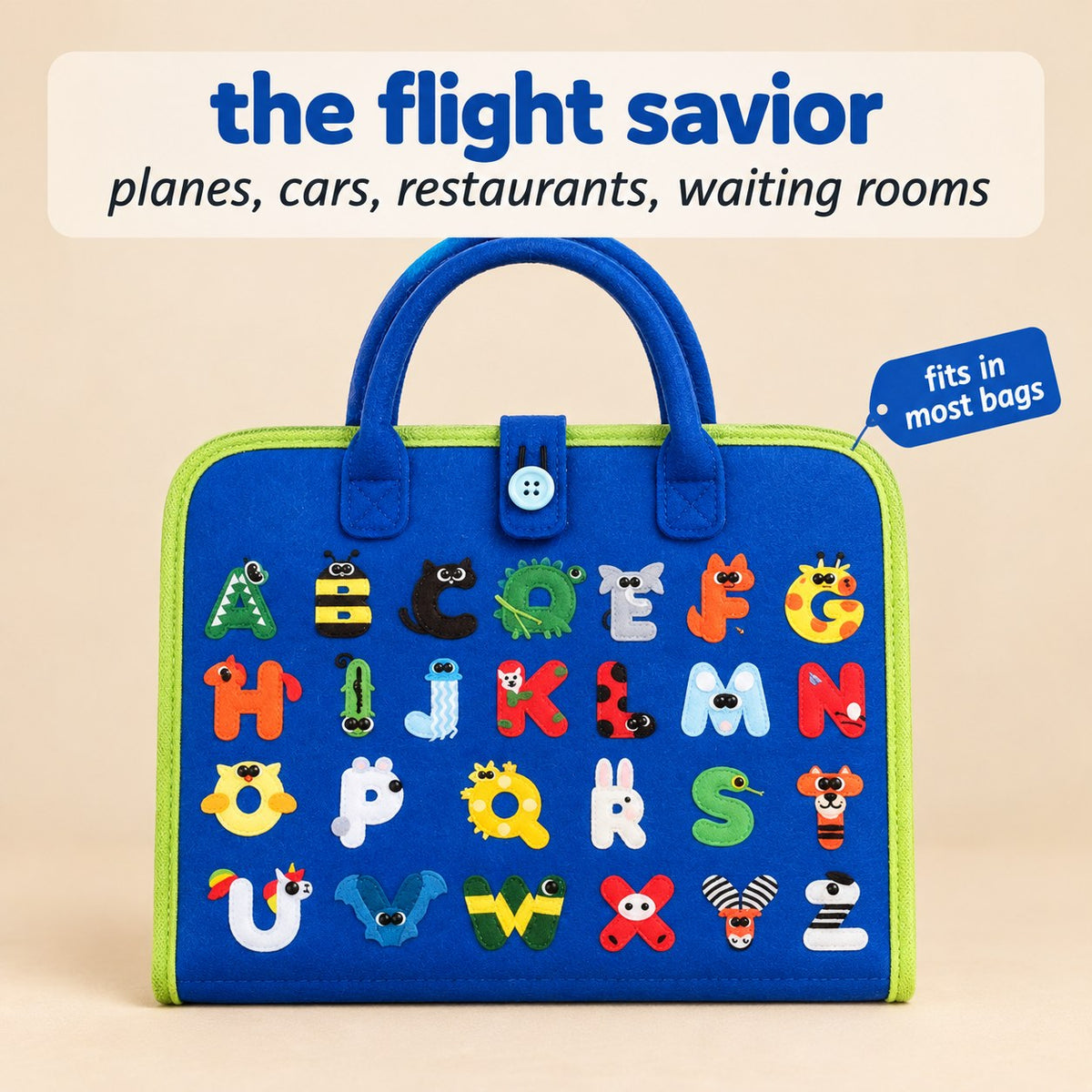 The Pomence Montessori Busy Board closed on a warm beige seamless background, its royal blue front cover printed with an animal alphabet grid, showing how small it packs
