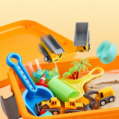 The shovel, roller tool, glow stones and toy trucks packed into the open orange bin