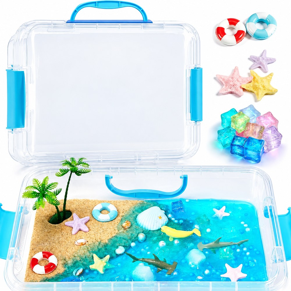 The Pomence Sensory Bin Play Set, ocean theme: the clear bin open with sand, blue filler and sea creatures