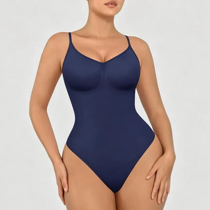 The product's own listing photo: the navy thong bodysuit on the body, cropped torso, plain gray background.