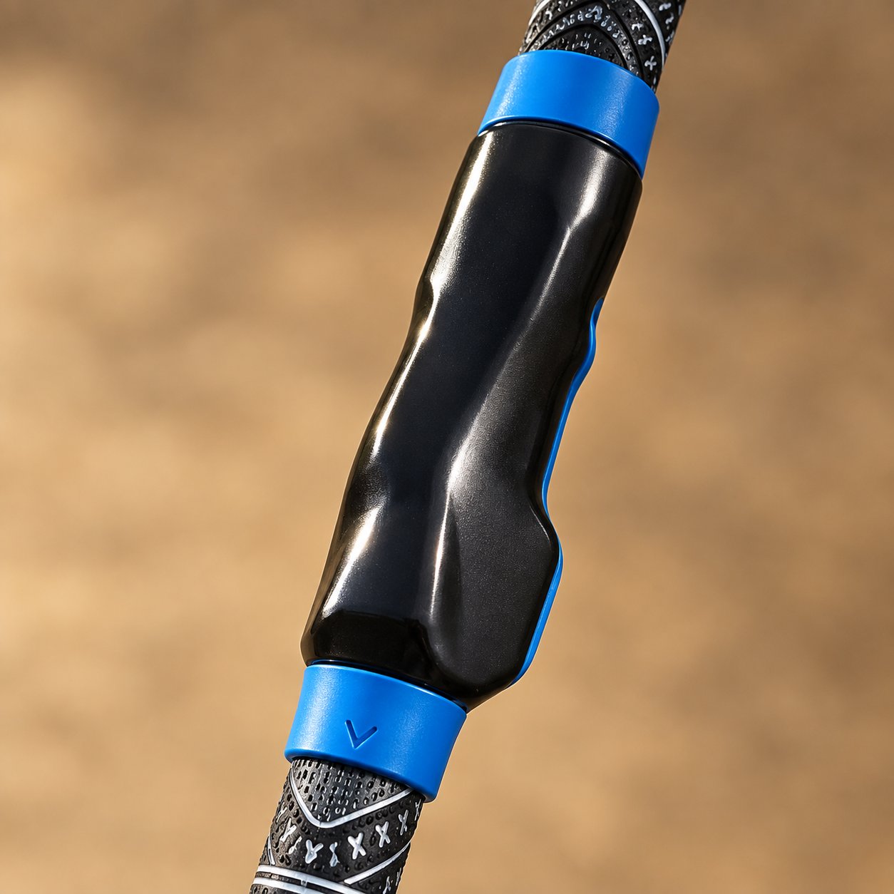 The open underside channel of the grip trainer shown off the club so the clip on shape is visible