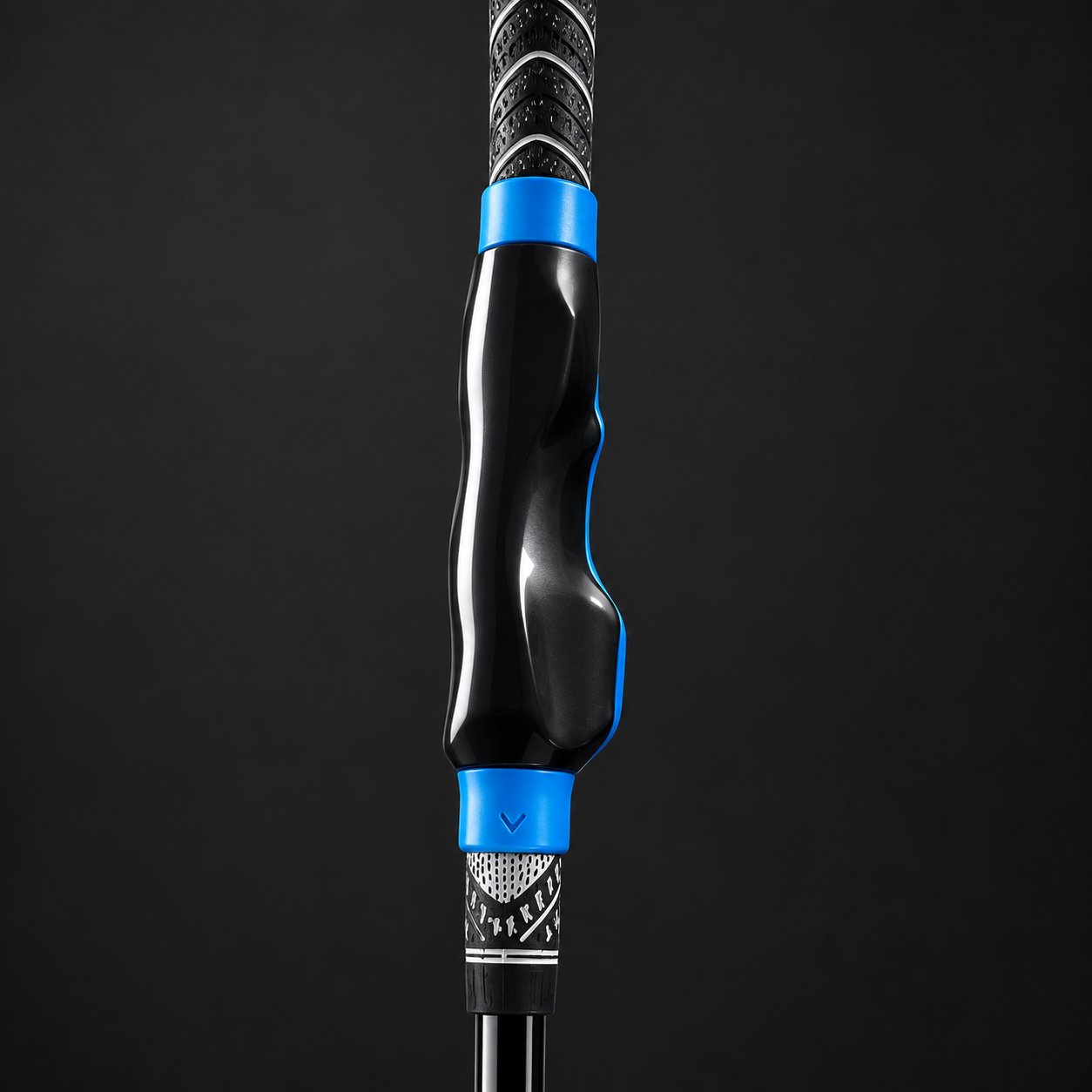 The Pomence Golf Grip Trainer shown alone on a dark ground