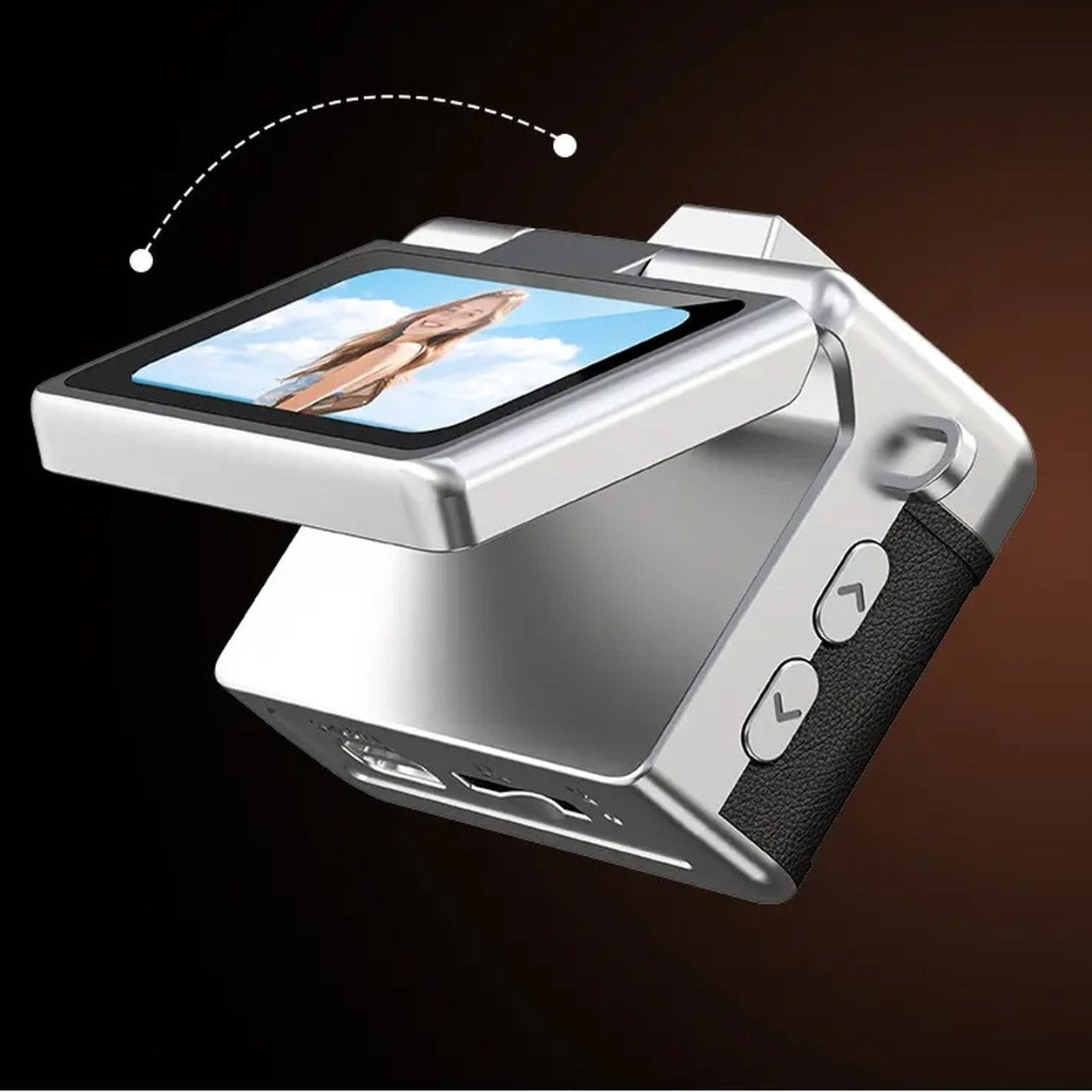 The Pomence Mini Keychain Camera with its screen flipped up over the top for a selfie