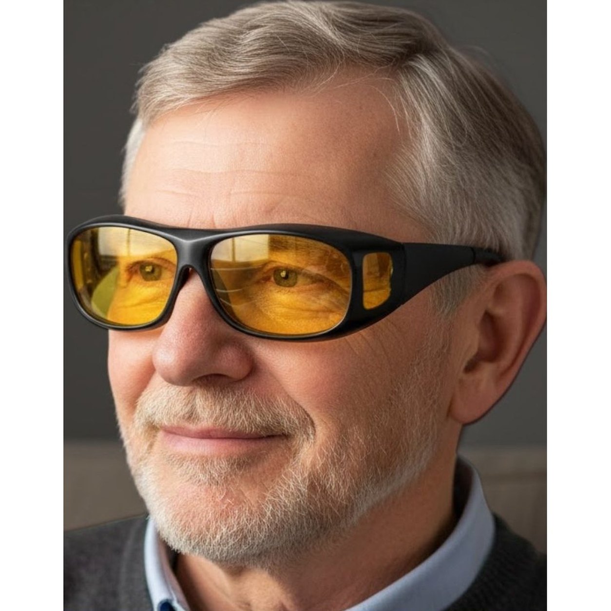 A man wearing the one-piece wrap frame with yellow lenses