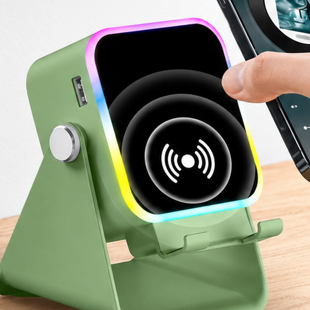 The glowing light ring of the Pomence Speaker Phone Stand behind a phone